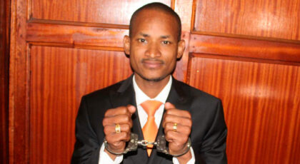 Babu Owino in hand cuffs