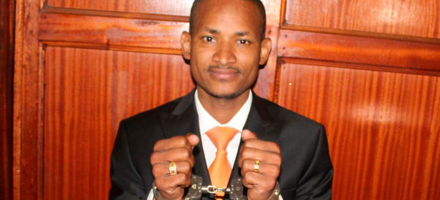 Babu Owino in hand cuffs