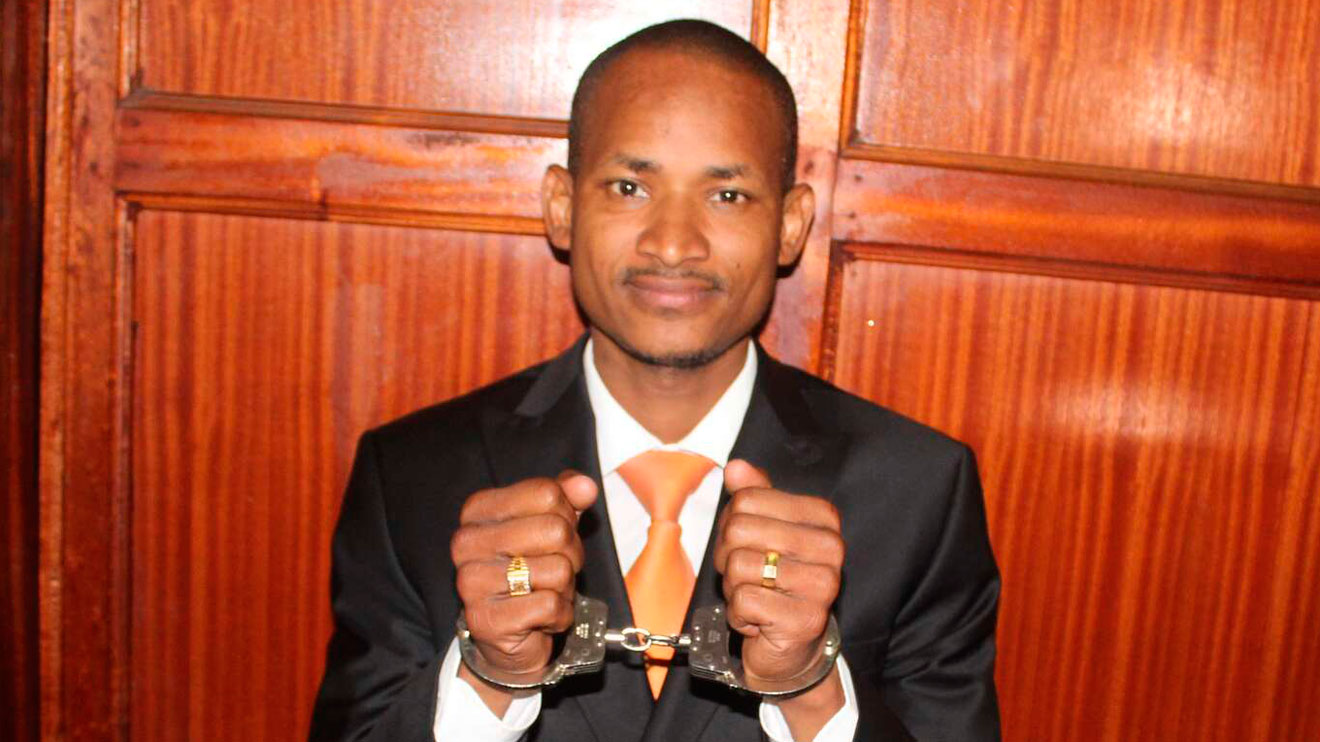Babu Owino in hand cuffs